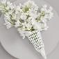 White boutonniere in holder