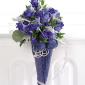 Glittered blue-dyed rose pew decoration