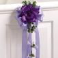 Purple glamellia pew decoration