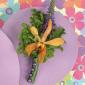 Orange and purple boutonniere