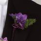 Purple freesia boutonniere