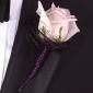 Feather and ribbon boutonniere