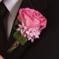 Pink rose boutonniere