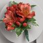 Alstroemeria and hypericum boutonniere