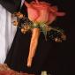 Beaded orange rose boutonniere