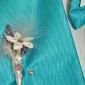 Muscari and stephanotis boutonniere