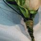 Leaf wrapped rose corsage